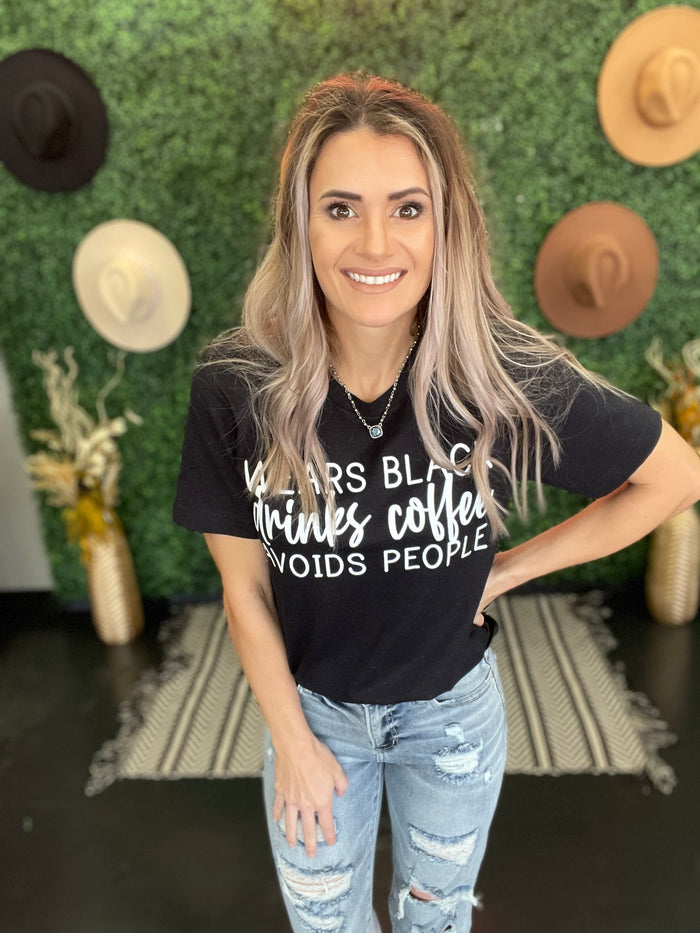 Wears Black, drinks coffee, avoids people